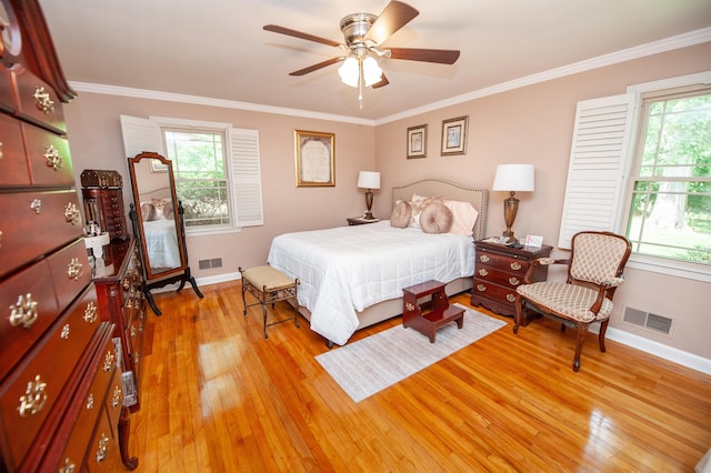147 Hillbrook Dr, Spartanburg, SC 29307 - bedroom featuring light wood finished floors, multiple windows, crown molding, and a ceiling fan