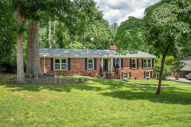 147 Hillbrook Dr, Spartanburg, SC 29307 - single story home with brick siding, a front lawn, and a chimney