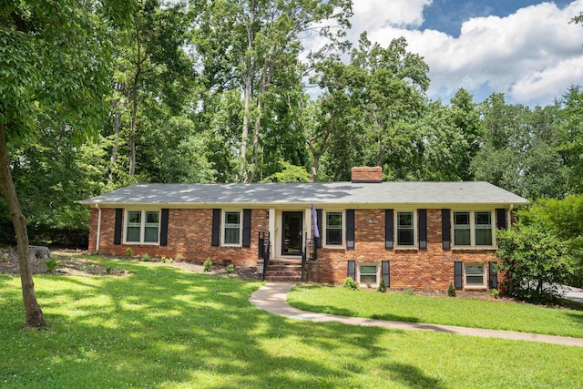 147 Hillbrook Dr, Spartanburg, SC 29307 - single story home featuring brick siding, a front yard, and a chimney