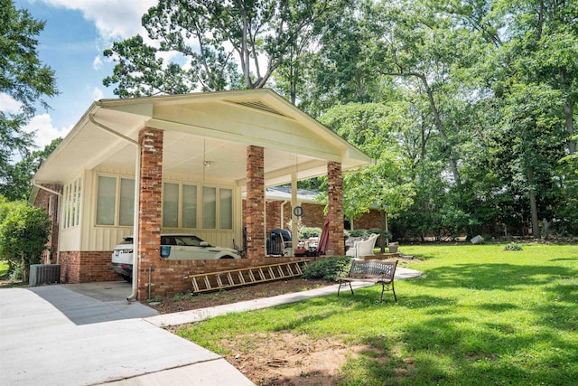 147 Hillbrook Dr, Spartanburg, SC 29307 - view of front facade featuring board and batten siding, a front lawn, and brick siding