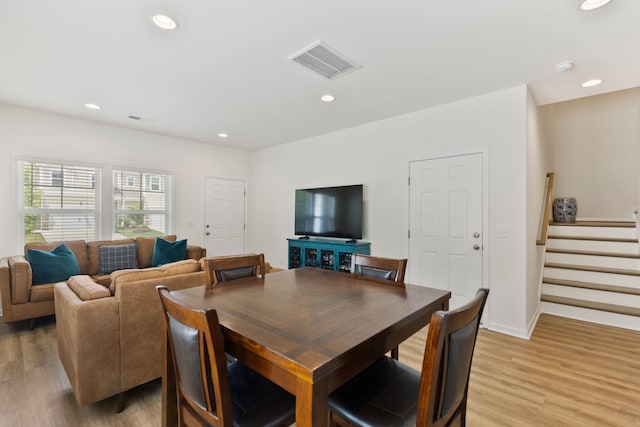 3008 Olivette Pl, Duncan, SC 29334 - dining space with light wood-type flooring, stairway, and recessed lighting