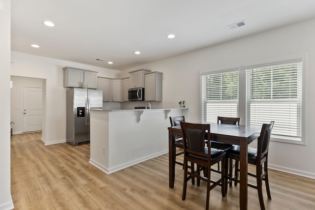 3008 Olivette Pl, Duncan, SC 29334 - dining space with light wood-style flooring and recessed lighting