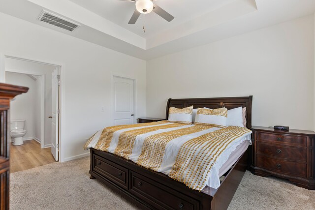 3008 Olivette Pl, Duncan, SC 29334 - bedroom with a raised ceiling, light colored carpet, and ceiling fan