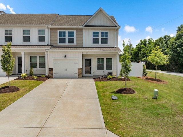 3008 Olivette Pl, Duncan, SC 29334 - view of front facade featuring board and batten siding, concrete driveway, roof with shingles, stone siding, and an attached garage