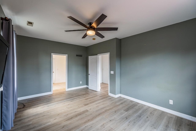 811 S Edisto River Dr, Roebuck, SC 29376 - unfurnished bedroom featuring light wood-style flooring and a ceiling fan