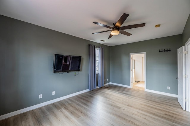 811 S Edisto River Dr, Roebuck, SC 29376 - unfurnished bedroom with light wood-style floors and ceiling fan