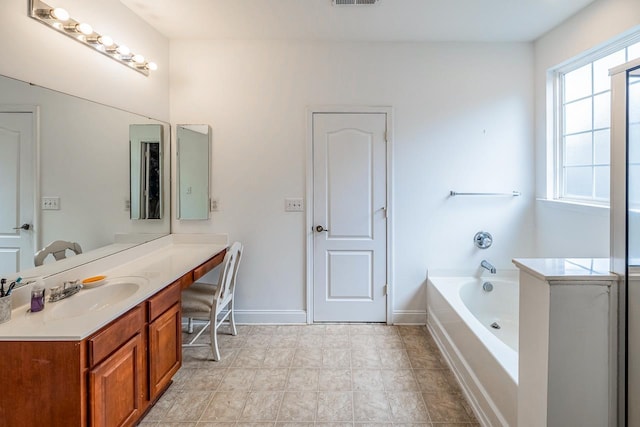 811 S Edisto River Dr, Roebuck, SC 29376 - bathroom with vanity and a bath