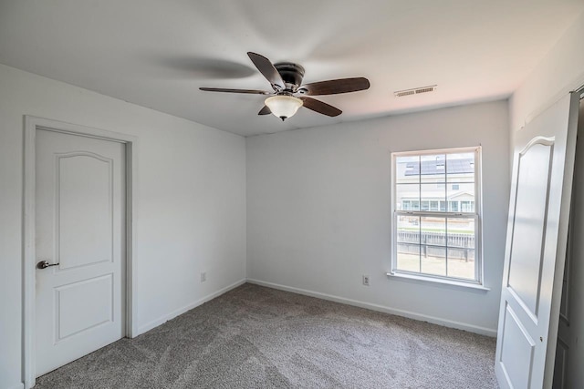 811 S Edisto River Dr, Roebuck, SC 29376 - unfurnished room featuring a ceiling fan and carpet flooring