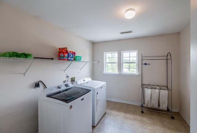 811 S Edisto River Dr, Roebuck, SC 29376 - laundry room with washer and clothes dryer and baseboards