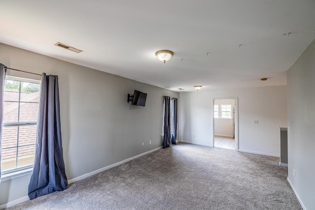 811 S Edisto River Dr, Roebuck, SC 29376 - carpeted spare room with baseboards