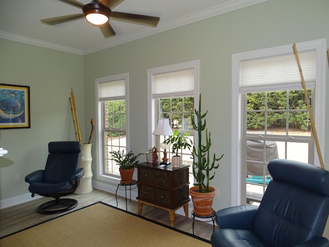 811 White Magnolia Dr, Inman, SC 29349 - sitting room with wood finished floors, healthy amount of natural light, ornamental molding, and a ceiling fan