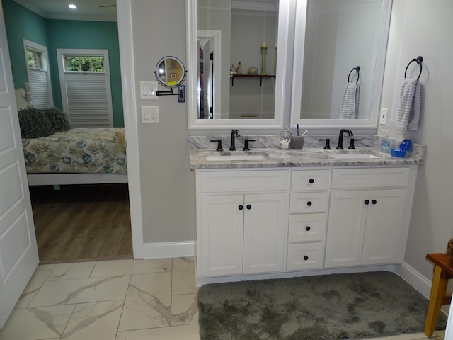 811 White Magnolia Dr, Inman, SC 29349 - ensuite bathroom with double vanity, recessed lighting, crown molding, and marble look tiles