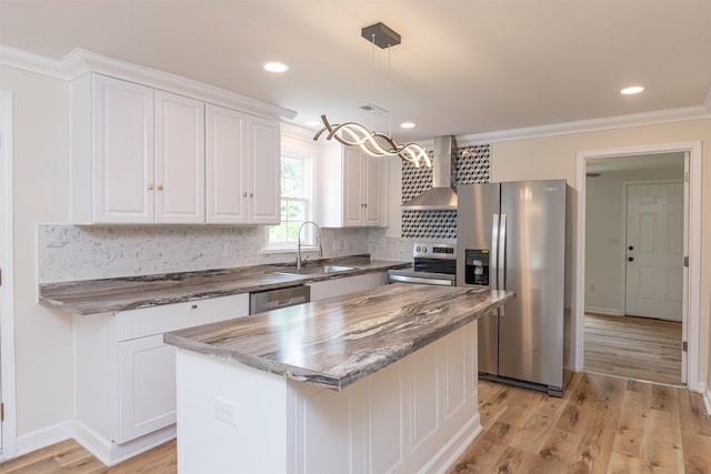 1230 Edgewood Ave, Spartanburg, SC 29301 - kitchen with appliances with stainless steel finishes, wall chimney exhaust hood, white cabinets, crown molding, and recessed lighting