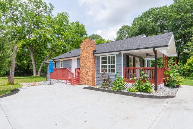 1230 Edgewood Ave, Spartanburg, SC 29301 - view of front of house with a porch, a shingled roof, ceiling fan, and a chimney