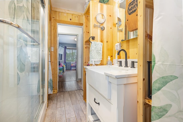 101 Jordan Rd, Lyman, SC 29365 - full bathroom featuring vanity, a stall shower, and wood finished floors