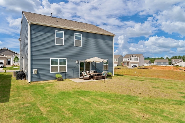 220 Emerald Creek Ave, Greer, SC 29651 - back of property featuring an outdoor hangout area, a yard, and a patio area