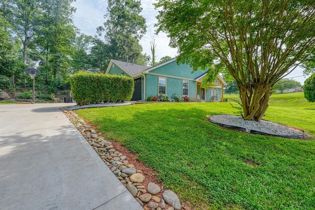 203 Palmetto Dr, Greer, SC 29651 - ranch-style home with driveway, a front lawn, an attached garage, and stucco siding
