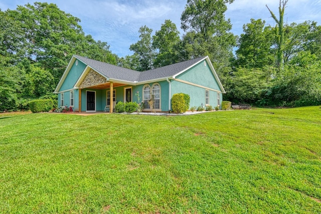 203 Palmetto Dr, Greer, SC 29651 - ranch-style home featuring a front lawn, stucco siding, and french doors