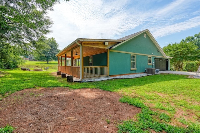 203 Palmetto Dr, Greer, SC 29651 - view of home's exterior with an attached garage, a ceiling fan, driveway, and a lawn