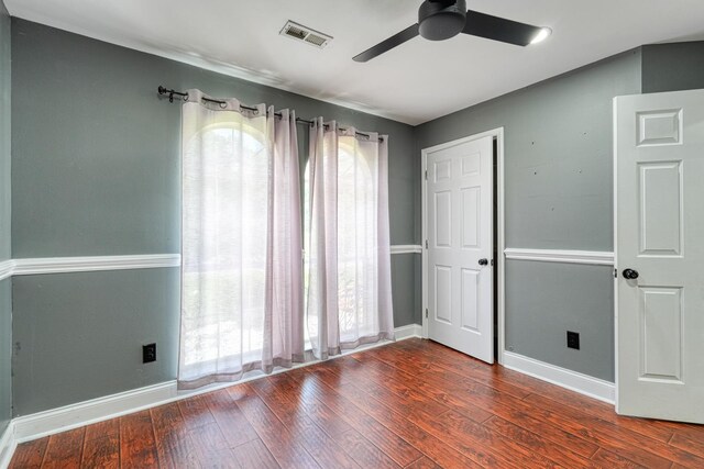 203 Palmetto Dr, Greer, SC 29651 - empty room featuring plenty of natural light, ceiling fan, and wood finished floors