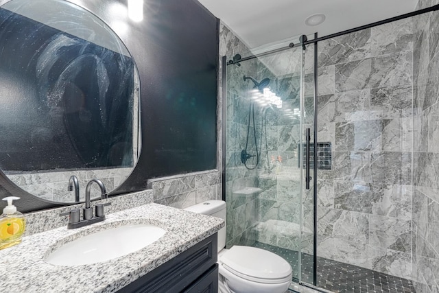 203 Palmetto Dr, Greer, SC 29651 - full bath featuring tile walls, vanity, a stall shower, and wainscoting