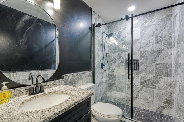 203 Palmetto Dr, Greer, SC 29651 - full bathroom with tile walls, vanity, a stall shower, and a wainscoted wall