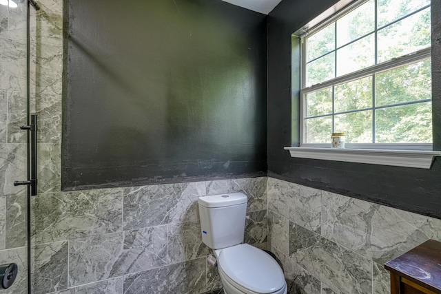 203 Palmetto Dr, Greer, SC 29651 - bathroom featuring tile walls and a wainscoted wall