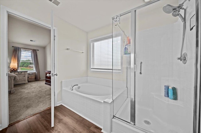 9035 Germaine Ct, Boiling Springs, SC 29316 - full bath featuring a shower stall, wood finished floors, and a garden tub