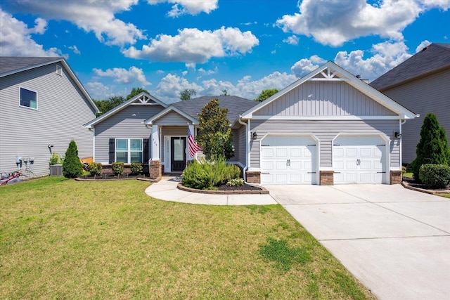 505 E Czardas Way, Woodruff, SC 29375 - craftsman-style home featuring a garage, brick siding, driveway, a front lawn, and board and batten siding