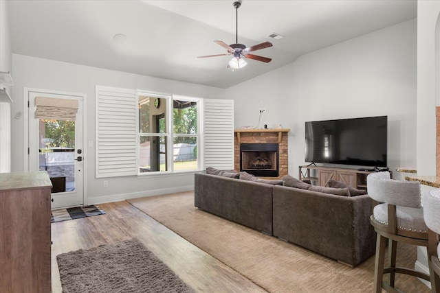 505 E Czardas Way, Woodruff, SC 29375 - living area featuring lofted ceiling, ceiling fan, a fireplace, and wood finished floors
