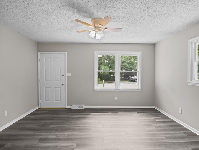 126 Loblolly Dr, Wellford, SC 29385 - entryway featuring ceiling fan, a textured ceiling, and wood finished floors