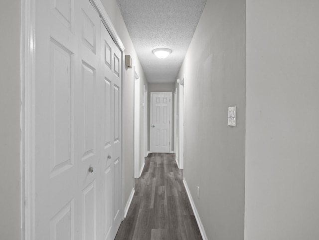 126 Loblolly Dr, Wellford, SC 29385 - hall with a textured ceiling and dark wood-type flooring