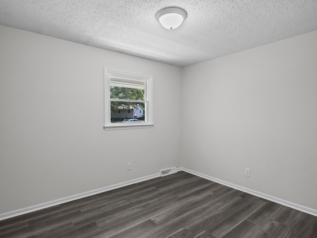 126 Loblolly Dr, Wellford, SC 29385 - empty room with dark wood-style flooring and a textured ceiling