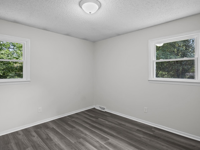 126 Loblolly Dr, Wellford, SC 29385 - unfurnished room with dark wood-style floors and a textured ceiling