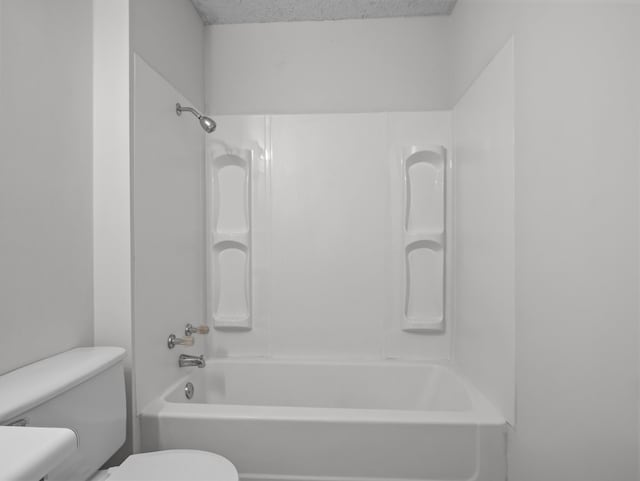 126 Loblolly Dr, Wellford, SC 29385 - bathroom featuring shower / tub combination and a textured ceiling