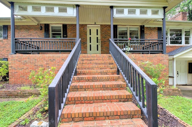 120 Branch St, Campobello, SC 29322 - property entrance featuring covered porch and brick siding