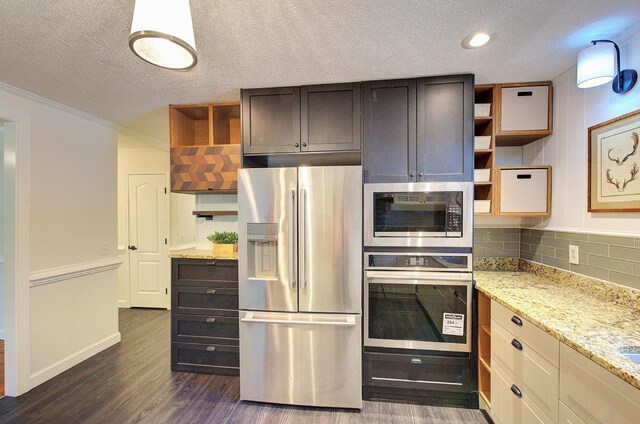 120 Branch St, Campobello, SC 29322 - kitchen featuring appliances with stainless steel finishes, open shelves, a textured ceiling, tasteful backsplash, and dark wood-style floors