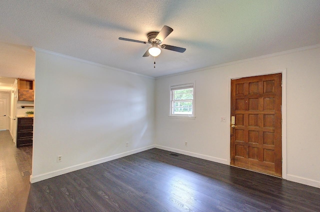 120 Branch St, Campobello, SC 29322 - empty room featuring dark wood finished floors, ornamental molding, a ceiling fan, and a textured ceiling