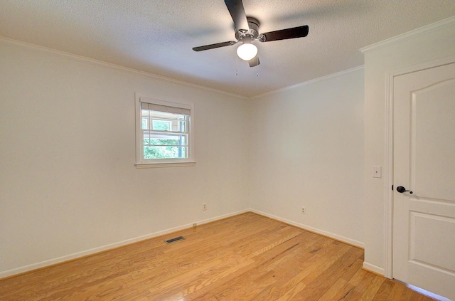 120 Branch St, Campobello, SC 29322 - empty room with light wood-style floors, ornamental molding, a ceiling fan, and a textured ceiling