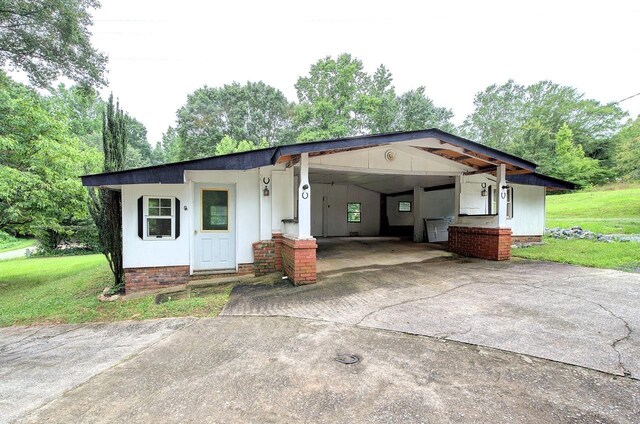 120 Branch St, Campobello, SC 29322 - view of front of property with driveway, a front lawn, and an attached carport