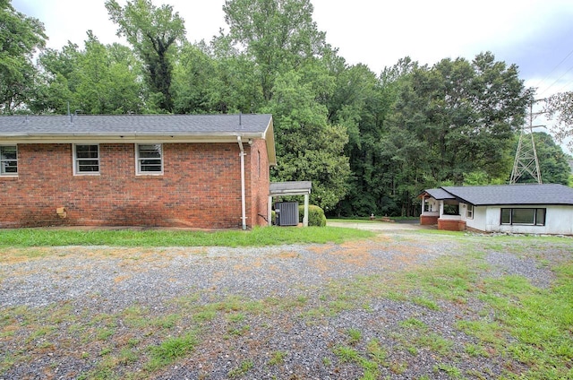 120 Branch St, Campobello, SC 29322 - view of side of property with brick siding and a cooling unit