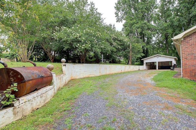 120 Branch St, Campobello, SC 29322 - view of yard featuring driveway and a detached carport