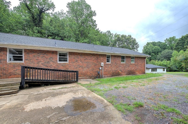 120 Branch St, Campobello, SC 29322 - view of property exterior featuring a wooden deck and brick siding