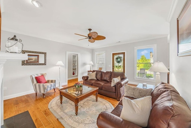 325 Reflection Dr, Lyman, SC 29365 - living area featuring ceiling fan, ornamental molding, and light wood-style floors