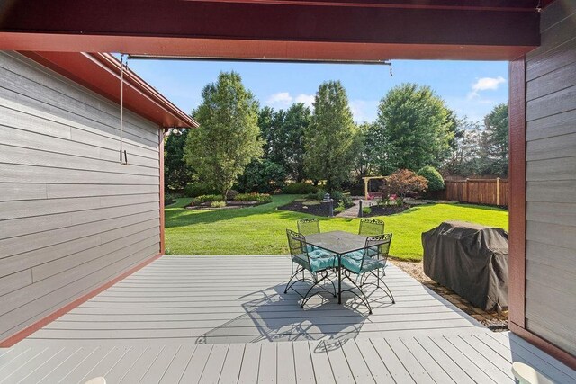 325 Reflection Dr, Lyman, SC 29365 - deck featuring outdoor dining area, area for grilling, and view of scattered trees
