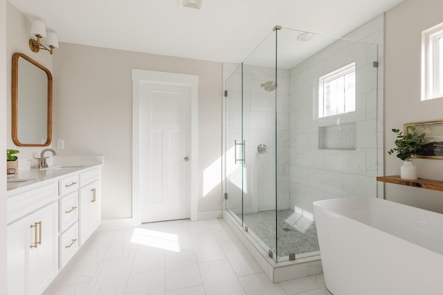 738 Judah Dr, Moore, SC 29369 - full bathroom featuring a stall shower, a freestanding tub, and vanity