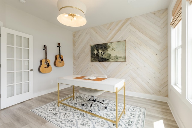 738 Judah Dr, Moore, SC 29369 - office area featuring wooden walls, light wood-style flooring, and an accent wall