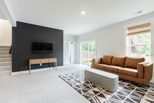 738 Judah Dr, Moore, SC 29369 - carpeted living room with stairs and baseboards