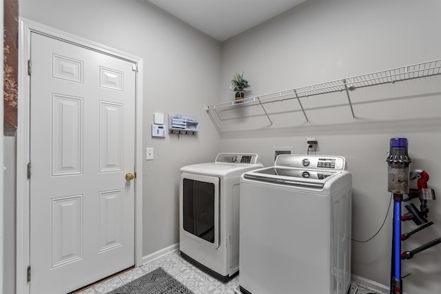 5 Modesto Ln, Simpsonville, SC 29681 - laundry area featuring washer and dryer and light tile patterned floors
