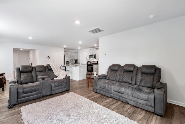 1808 Bridle Ln, Roebuck, SC 29376 - living area with recessed lighting and wood finished floors